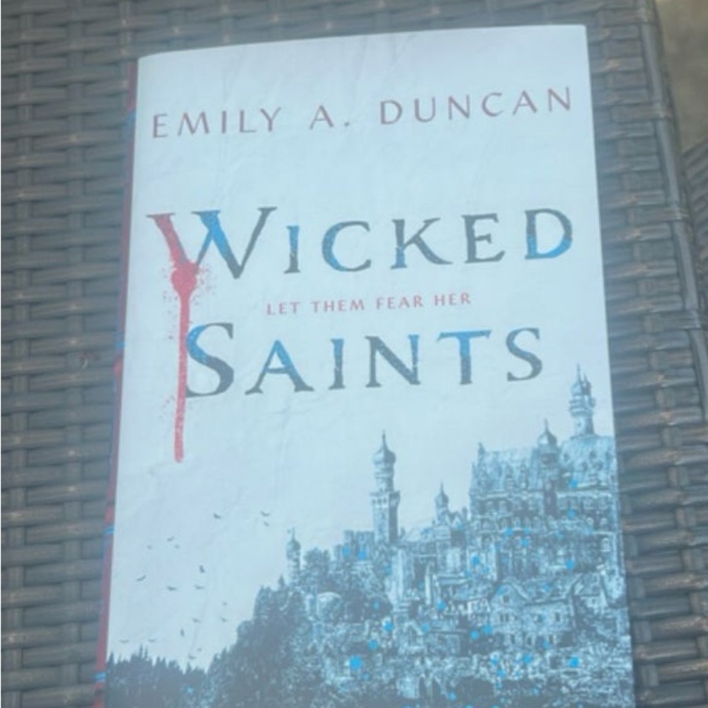 Wicked Saints Book by Emily A. Duncan - Blue and White Cover